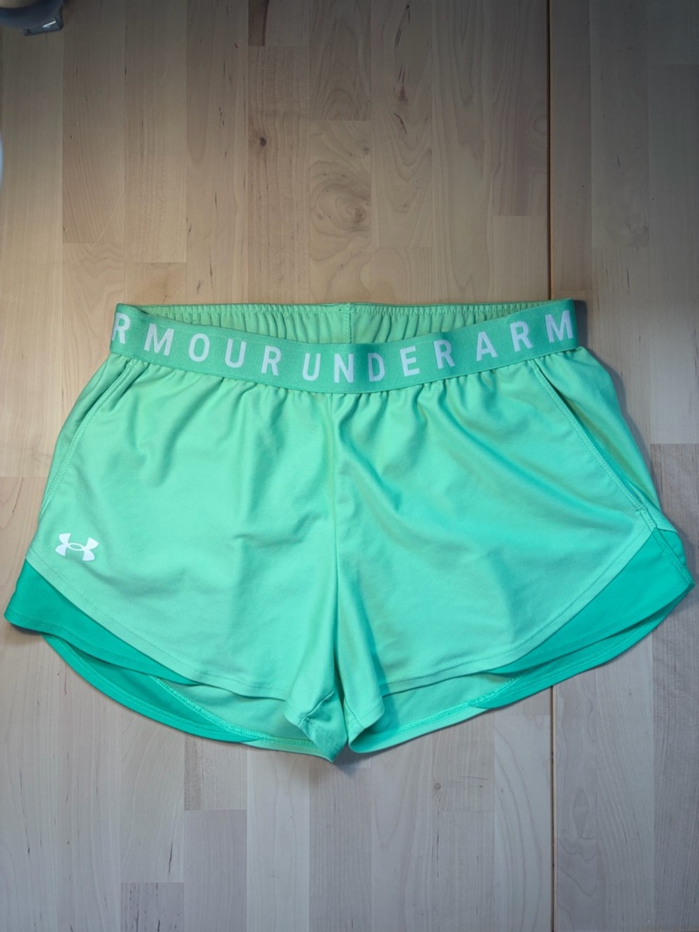 Under Armour Women's Mint Green Athletic Shorts with Logo Waistband